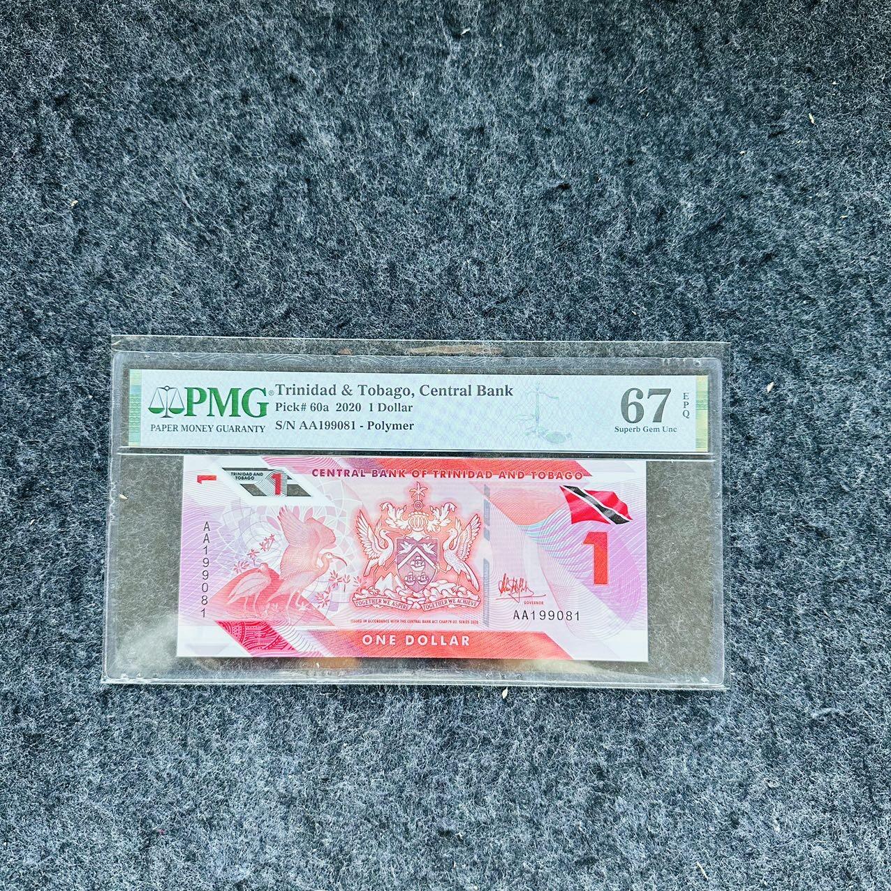 🇨🇳🇺🇳¥ ¥2026🐎新年塑料钞评级钞 特立尼达和多巴哥2021年1元，AA首发冠+倒置号，(AA199081)
