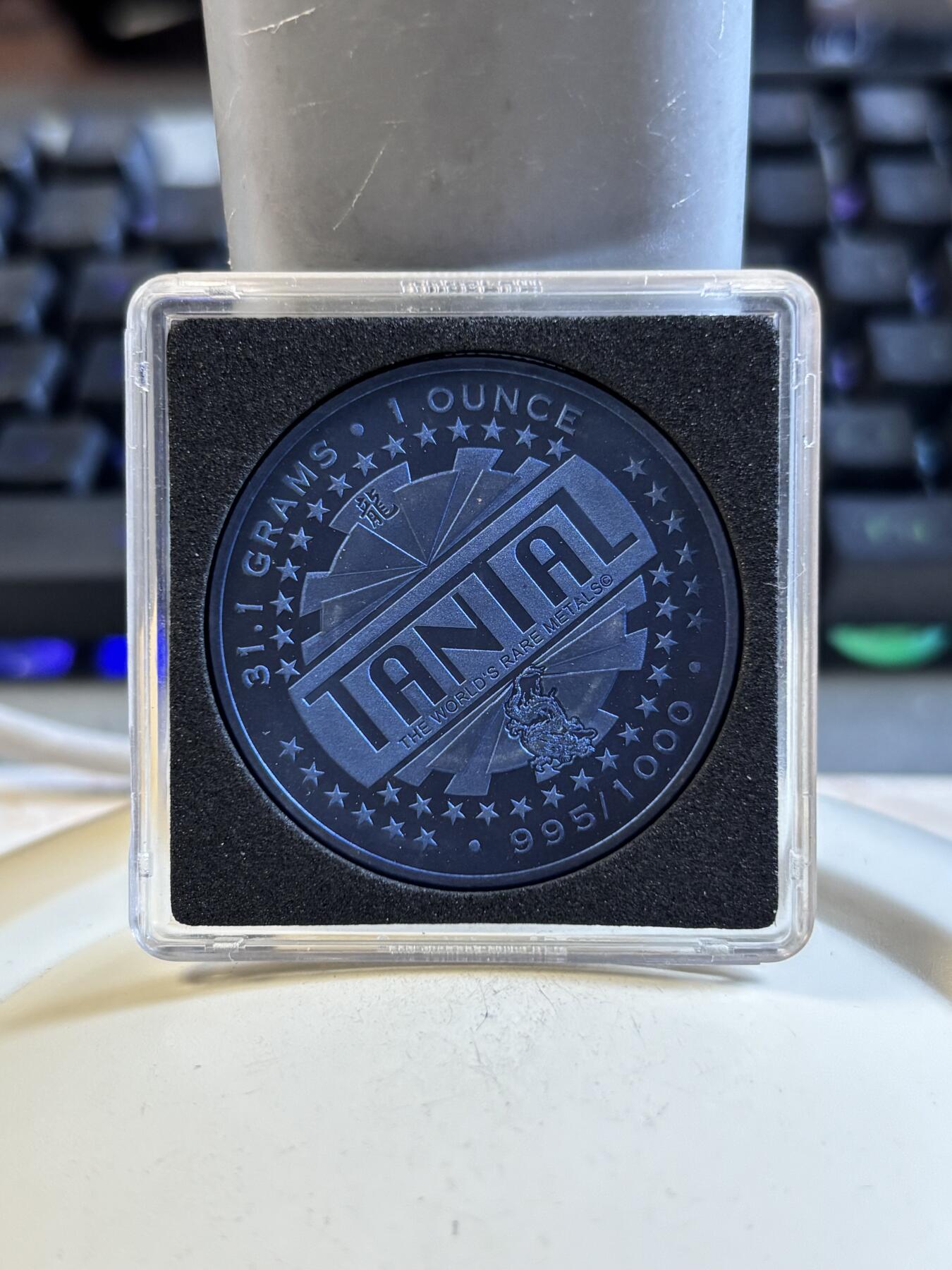 第191期拍卖 斐济2012年蓝色中国生肖系列龙1盎司世界首枚全钽金属纪念币，950钽，发行500枚