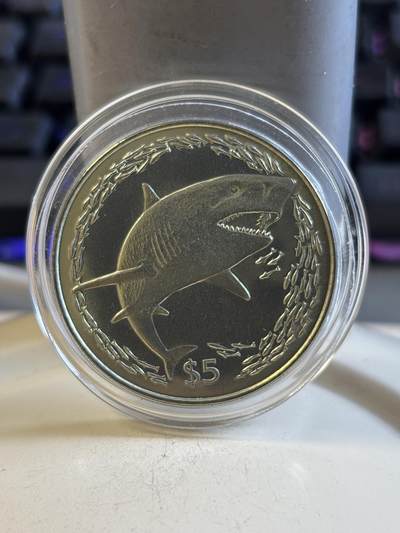 第191期拍卖 - 维尔京2016年动物系列鲨鱼柠檬黄色纯钛金属纪念币