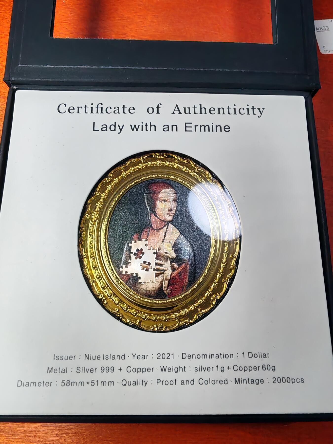长老汇马年精选第一场拍卖 2021纽埃抱貂的女人1元异形银铜双金属精制币，60克，盒证全，2000枚