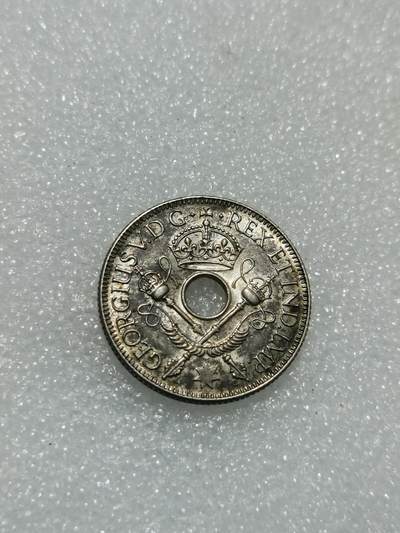 天下钱庄专场欢迎参拍 - 新几内亚中孔银币