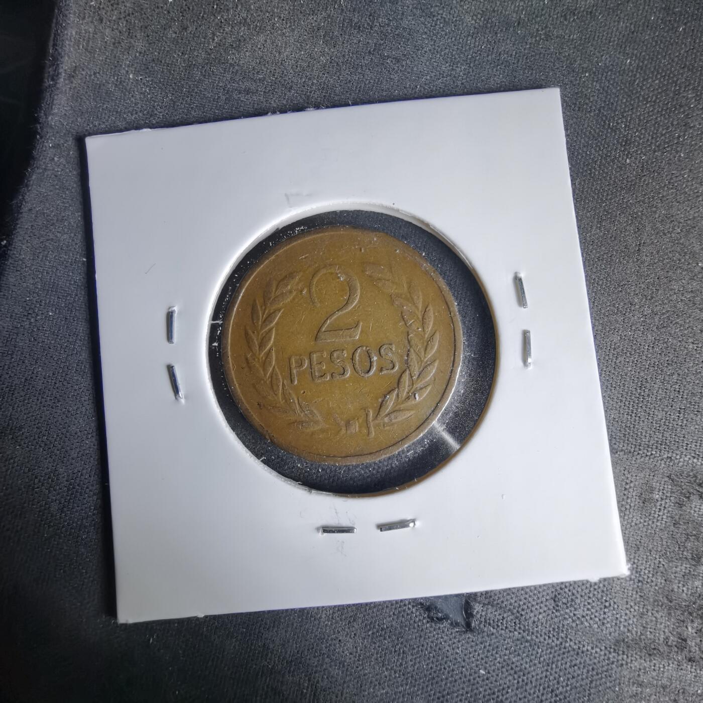 沼泽如烟--第999场 哥伦比亚1977年2比索