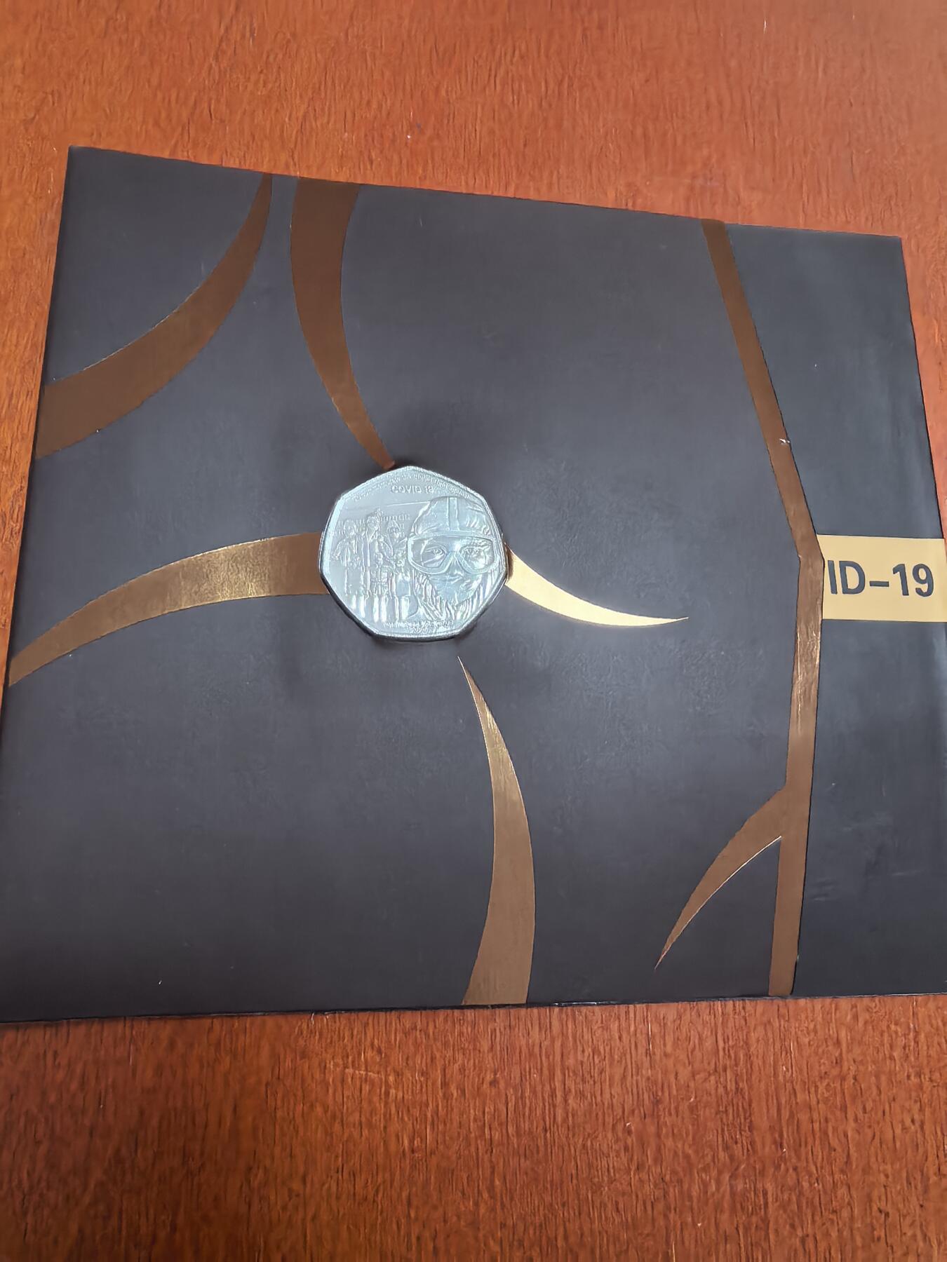 长老汇马年精选第二场拍卖 2020直布罗陀抗疫英雄50便士七边形铜镍币，卡装