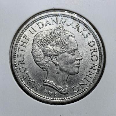外国优质老铜币银币，周日九点倒数截拍，满百包邮，持续收拍，初八发货 - 丹麦1979年玛格丽特二世女王10克朗，正面为女王的加冕形象，彰显丹麦君主立宪制的国家象征；背面的麦穗环绕面值，体现丹麦农业立国的传统，见证了丹麦在现代君主制下的稳定发展与货币体系的延续。