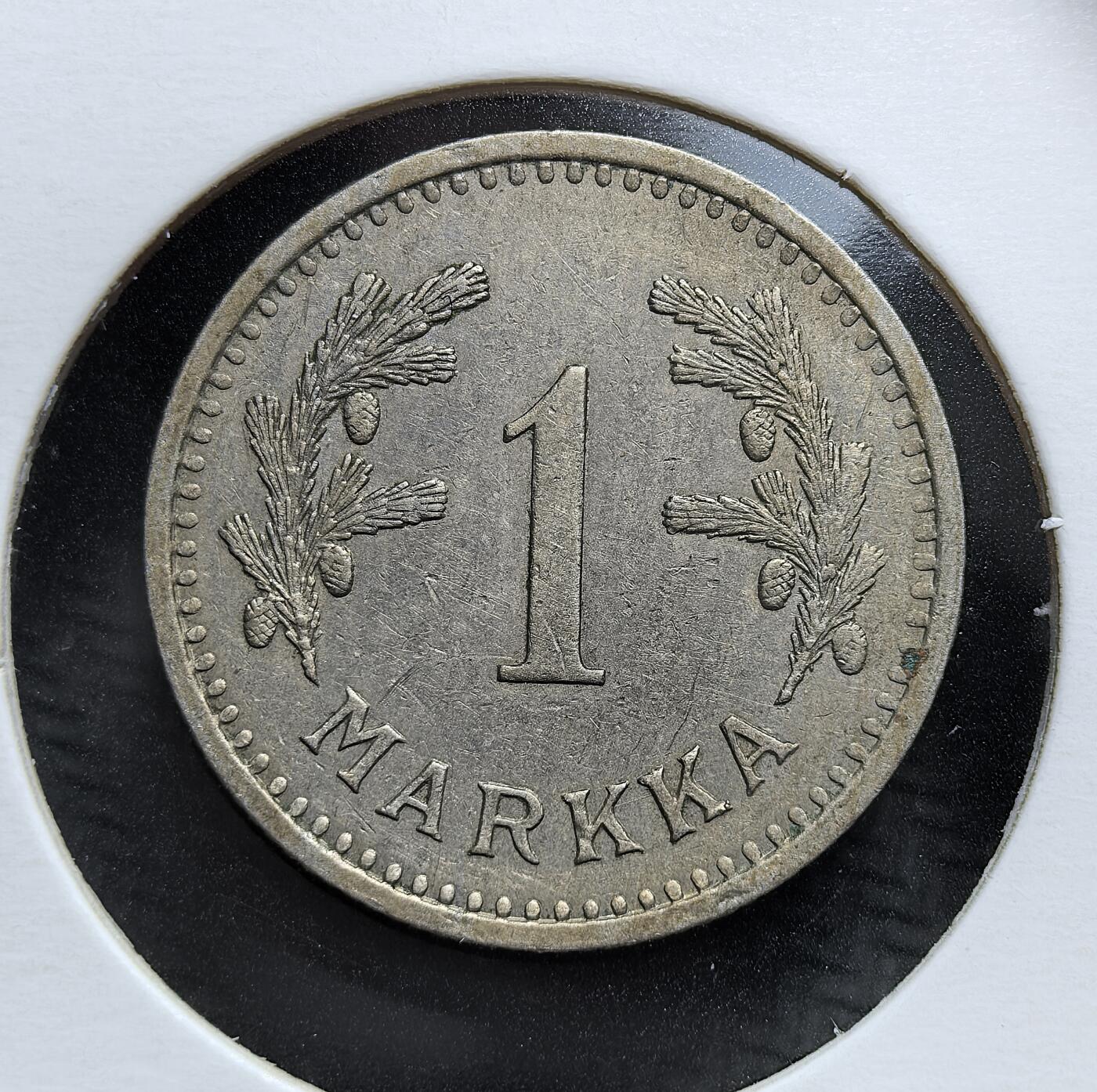 外国优质老铜币银币，周日九点倒数截拍，满百包邮，持续收拍，初八发货 芬兰1930年1马克，是芬兰独立后确立本国货币体系的重要币种。正面以云杉枝与松果象征北欧森林资源，背面是国徽 “持剑雄狮”，见证了芬兰在两次大战间的经济稳定与国家认同强化。