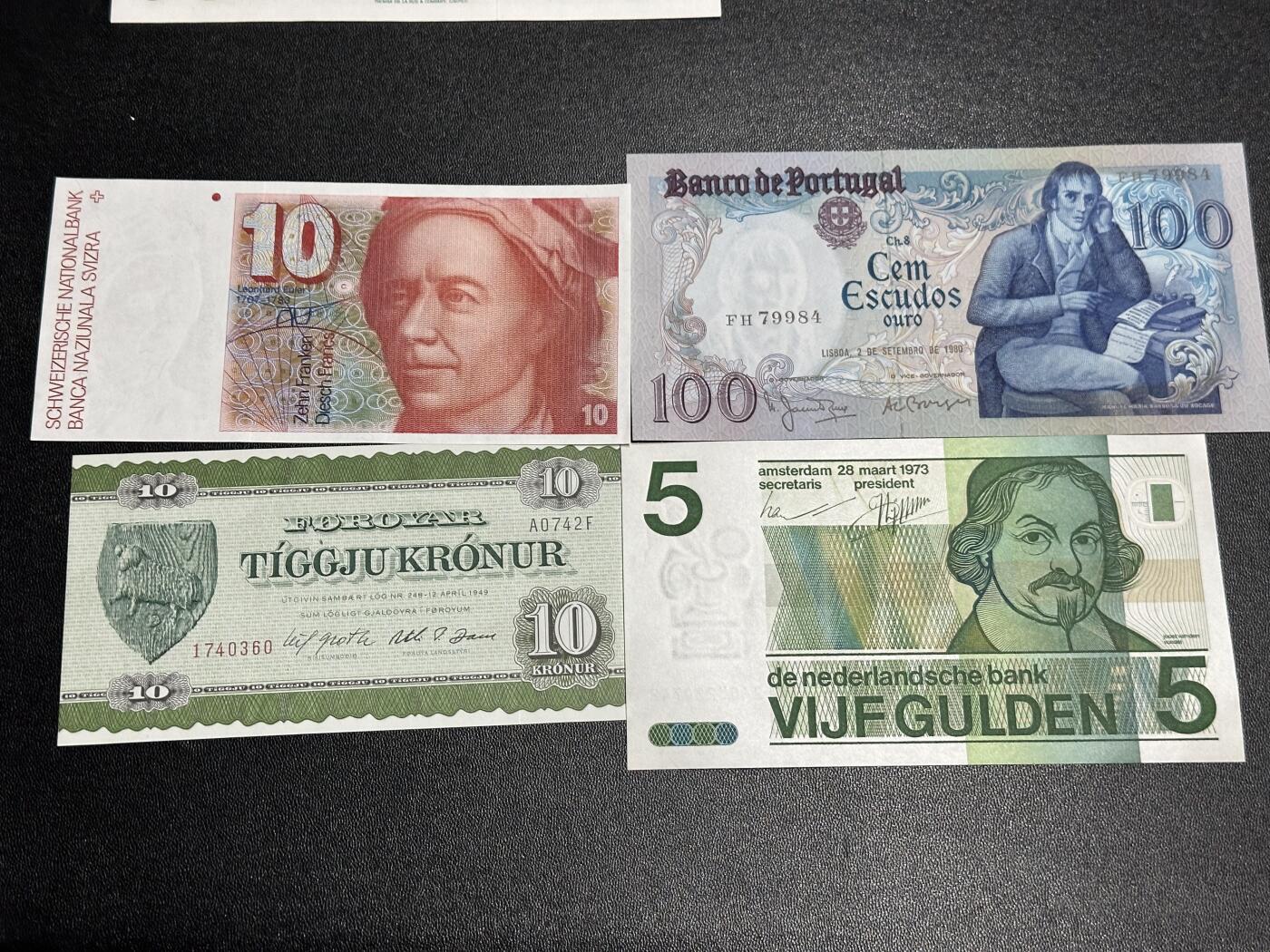 《外钞收藏家》第六百一十二期（ 精选场）（长期征集拍品、欢迎藏友们联系合作） 瑞士、法郎、葡萄牙、荷兰四张一起 全新UNC