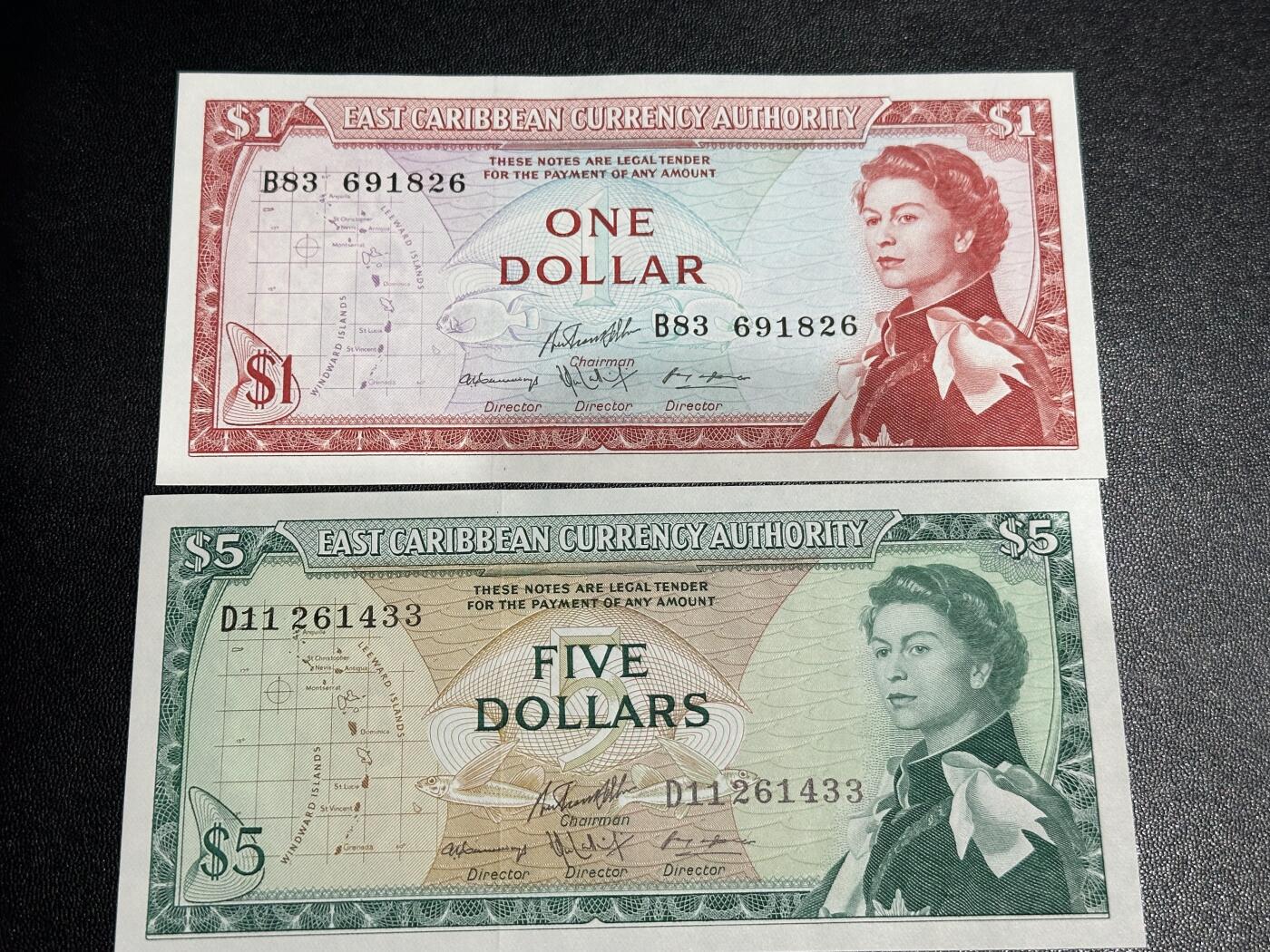 《外钞收藏家》第六百一十二期（ 精选场）（长期征集拍品、欢迎藏友们联系合作） 东加勒比戎装女王1和5元 2张一起 全新UNC