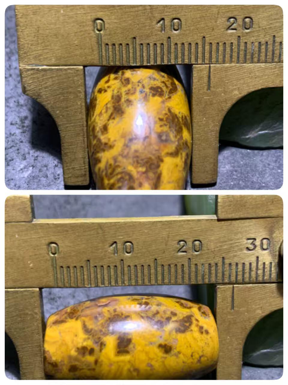 精美草花纹战国红玛瑙随形桶珠一个