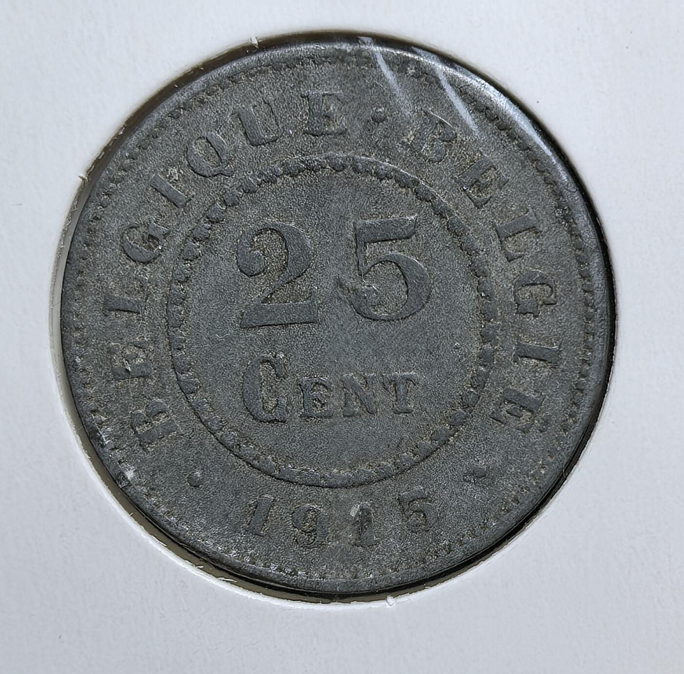 外国优质老铜币银币，周日九点倒数截拍，满百包邮，持续收拍，初八发货 比利时1915 年25 分锌币。正面是比利时国徽 “雄狮盾徽”，背面以法语 “BELGIQUE” 标注国名与面值。一战期间比利时被德国占领，物资极度匮乏，传统铜材短缺，因此改用廉价锌铸造货币，这枚硬币正是战争对民生与经济影响的直接见证。