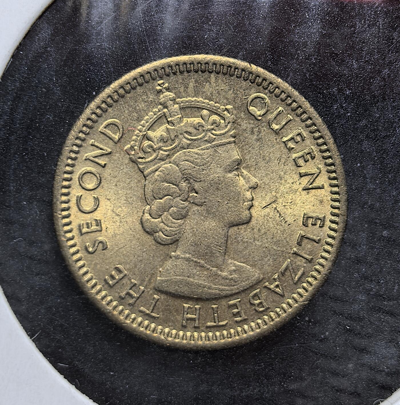 外国优质老铜币银币，周日九点倒数截拍，满百包邮，持续收拍，初八发货 原光香港1978年5 仙，发行于英属香港时期。正面以中英双语标注 “香港五仙” 与面值，背面为伊丽莎白二世头像，彰显英国殖民统治的象征，见证了香港在回归前的殖民货币体系与历史过渡。