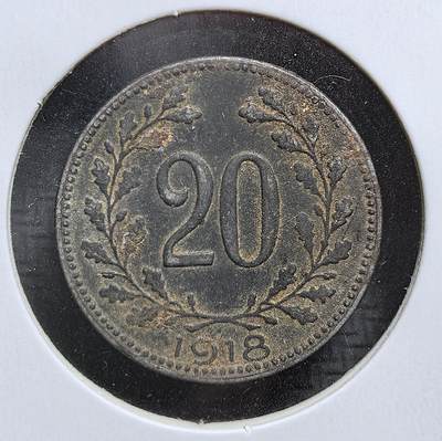 外国优质老铜币银币，周日九点倒数截拍，满百包邮，持续收拍，初八发货 - 奥匈帝国1918年20 赫勒铁币。正面的双头鹰徽是奥匈帝国的核心象征，背面的面值与年份则标注了其发行背景。一战末期帝国物资极度匮乏，铁币成为战时经济的产物，见证了奥匈帝国的崩溃与历史终结。