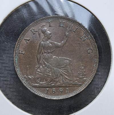 外国优质老铜币银币，周日九点倒数截拍，满百包邮，持续收拍，初八发货 - 极美品英国1891年维多利亚法新铜币，属于维多利亚时代 “日不落帝国” 的流通辅币。正面为年轻的维多利亚女王头像，背面是象征不列颠尼亚的坐像，见证了英国工业革命与全球殖民扩张的鼎盛时期。