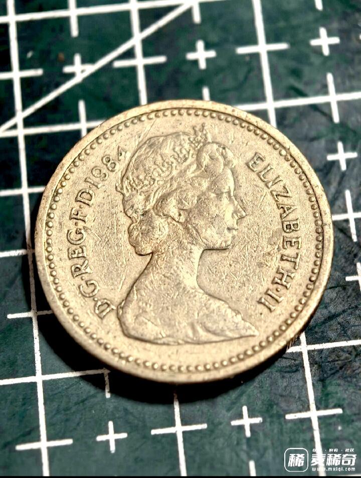英国1984年1英磅女皇头像/威尔士韮葱图案早期靓品硬币