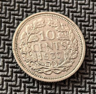 外国优质老铜币银币，周日九点倒数截拍，满百包邮，持续收拍，初八发货 - 荷兰1937年10分银币，发行于威廉敏娜女王统治时期。正面为女王像，彰显君主权威；背面的橡叶纹饰象征国家荣耀，见证了二战前荷兰的稳定与殖民帝国余晖，是荷兰近代货币史的重要载体。