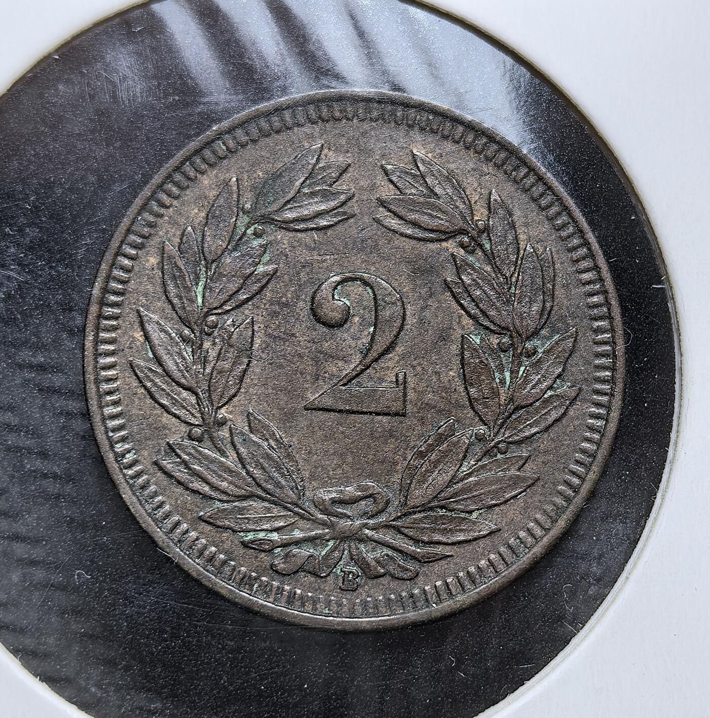 外国优质老铜币银币，周日九点倒数截拍，满百包邮，持续收拍，初八发货 瑞士1913年2分铜币。正面以 “HELVETIA” 与国徽彰显国家象征，背面的月桂枝象征和平，见证了瑞士在 20 世纪初的中立稳定与经济发展。