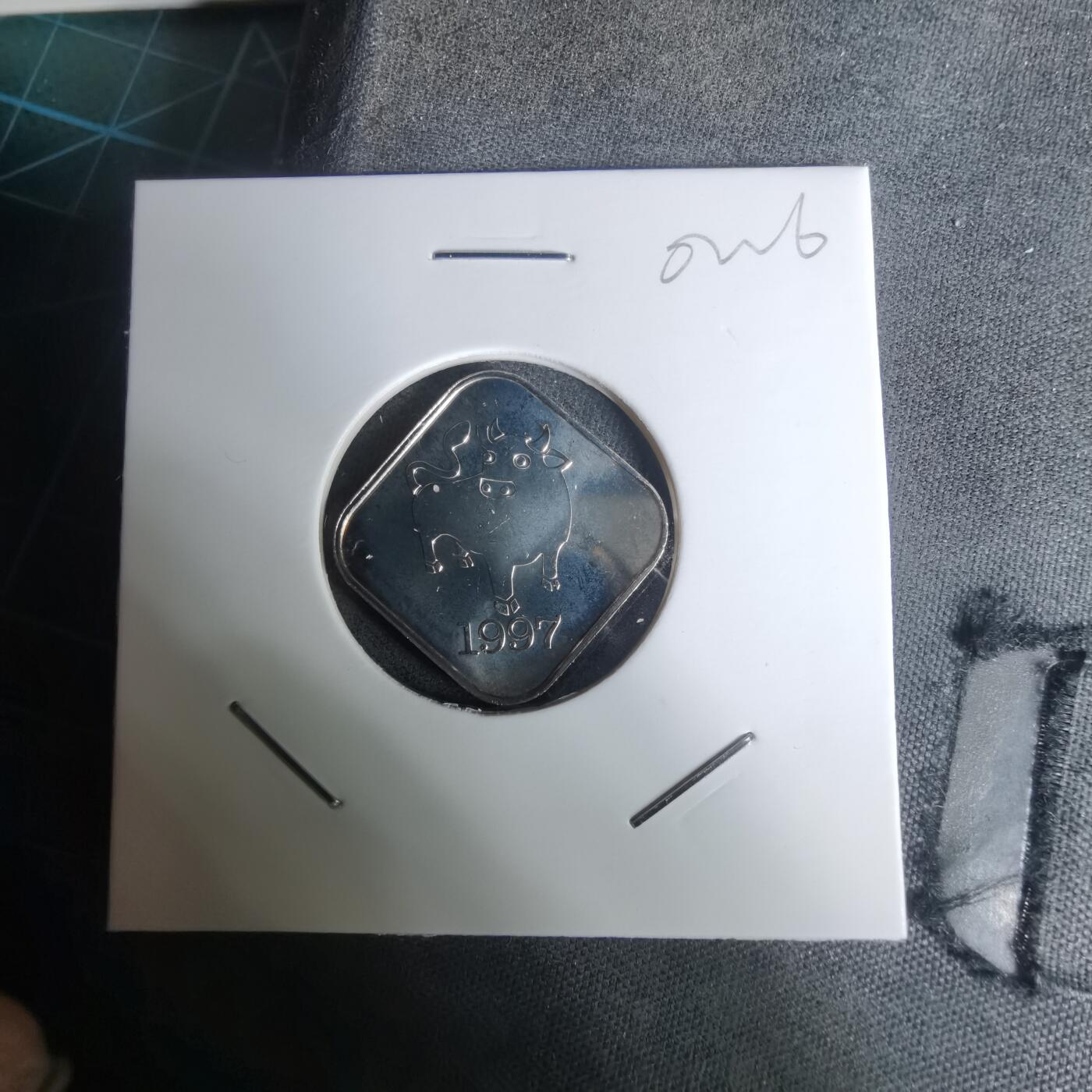 沼泽如烟--第1002场 1997年牛生肖章纯银章