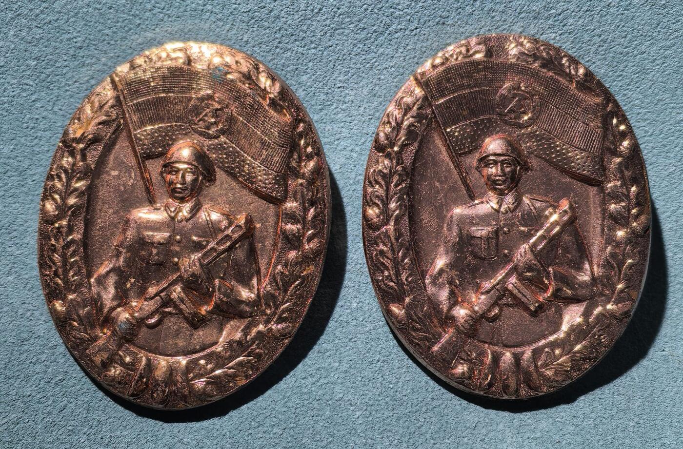 号角文化祝福各位藏友春节大吉马年入好藏 盛世勋华——号角文化勋章邮票专场拍卖第306期    东德人民军优异表现成就证章 2枚