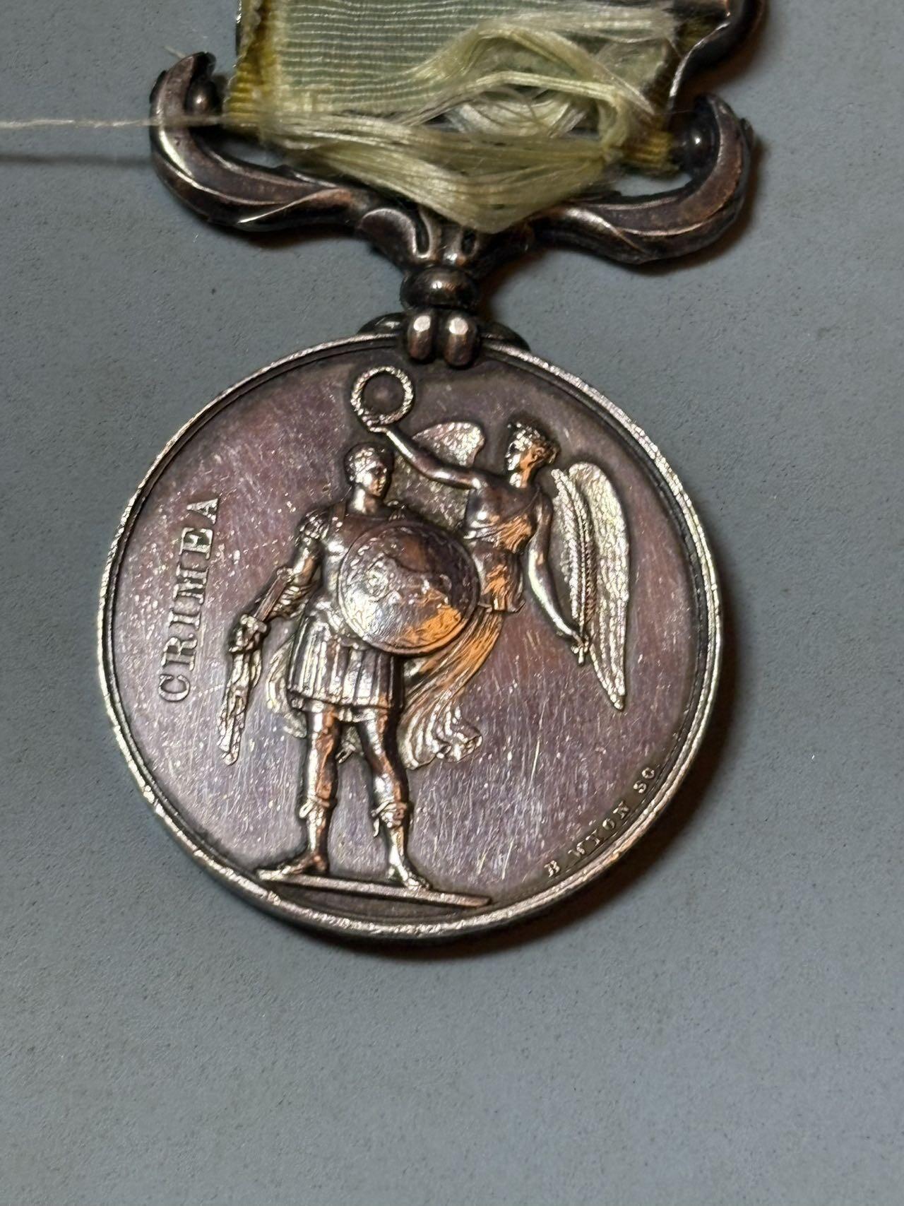 号角文化祝福各位藏友春节大吉马年入好藏 盛世勋华——号角文化勋章邮票专场拍卖第306期    英国1854年克里米亚战争奖章 银制  带塞瓦斯托波尔条 重40克