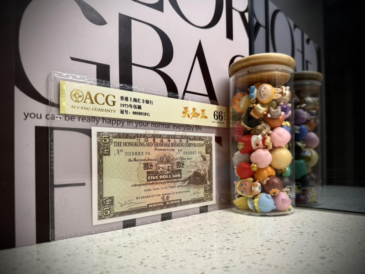 【乾奕收藏】出1973年香港上海汇丰银行伍圆，爱藏金标66E，号码全程无247天马王靓号，品相难得，保存状态很好，收藏价值高，喜欢的老板不要错过，包邮发货，评级币一切以分数为准，售出非假不退