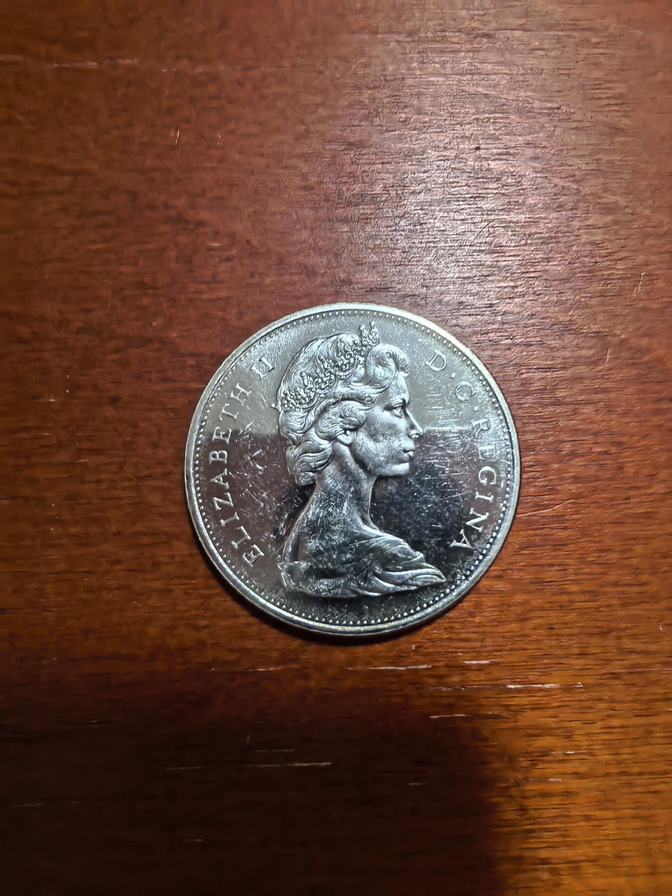 长老汇马年精选第四场拍卖 1965加拿大划船1元银币，23.33克800银，版本众多