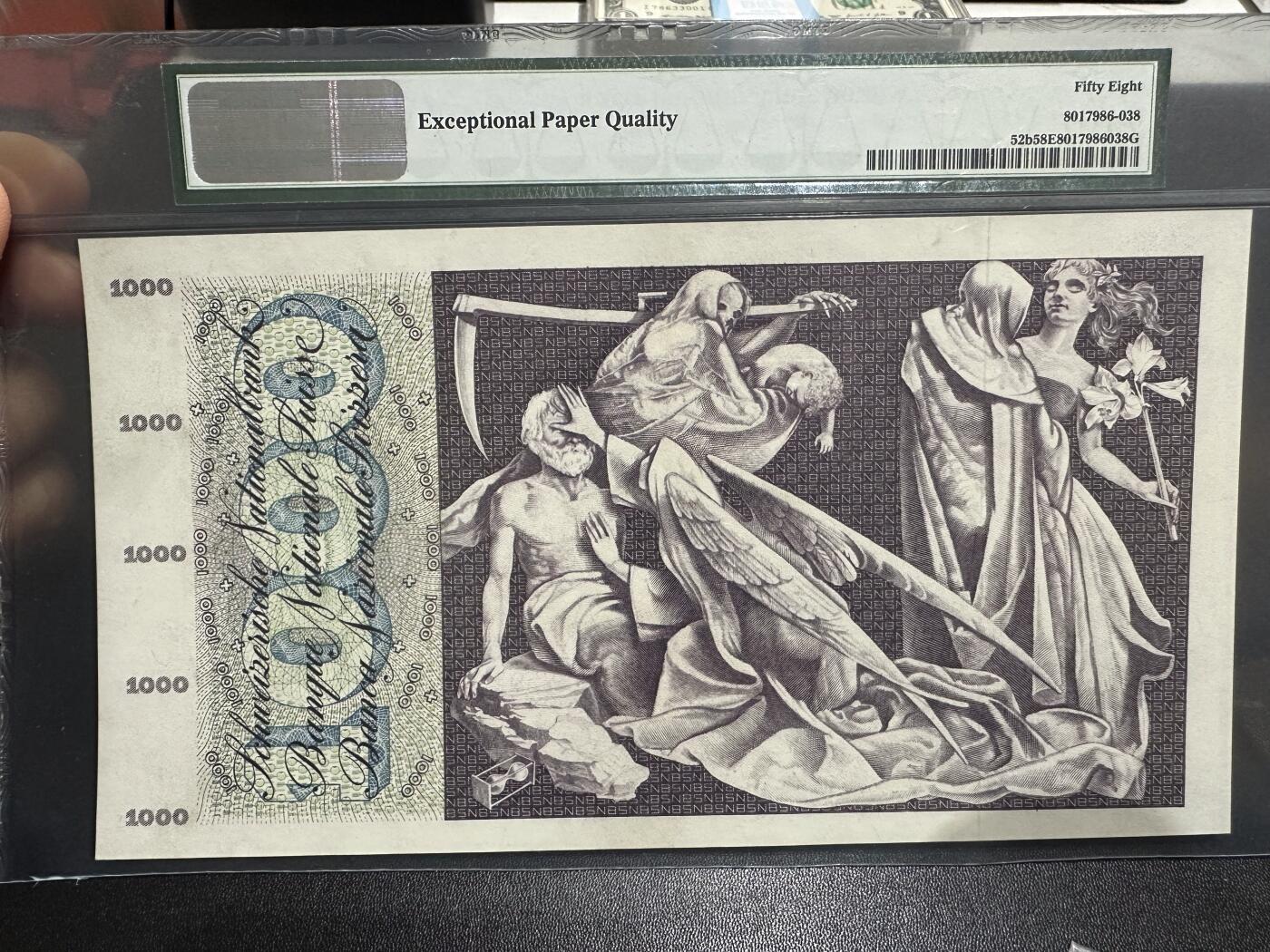 《外钞收藏家》第六百一十二期（ 精选场）（长期征集拍品、欢迎藏友们联系合作） 1957年瑞士1000法郎 死神 PMG58E 大票幅