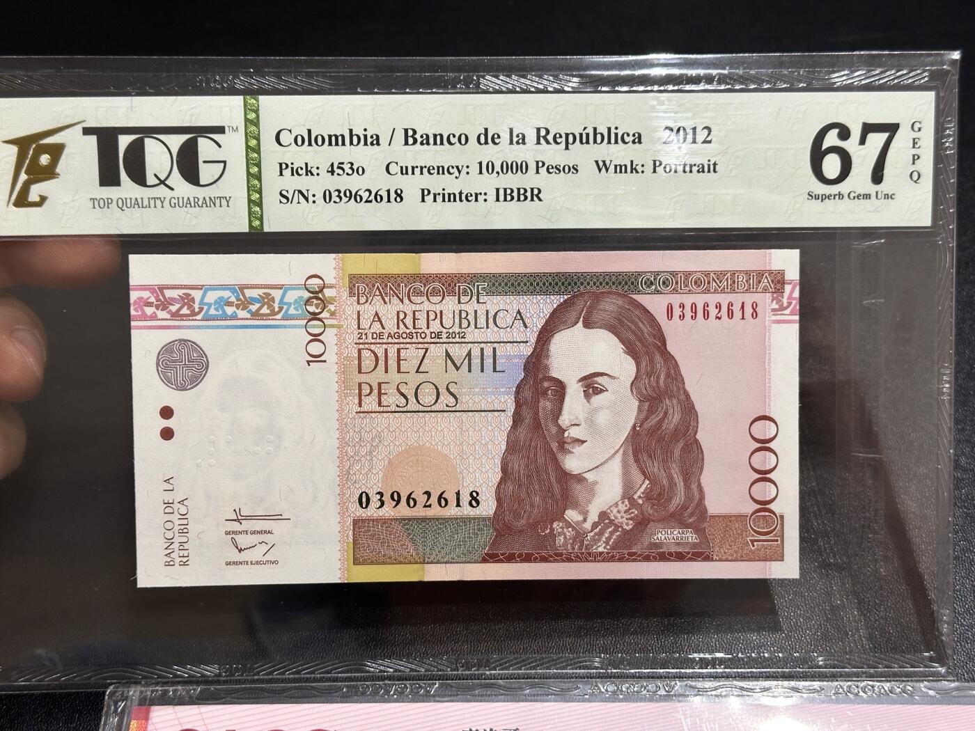 《外钞收藏家》第六百一十二期（ 精选场）（长期征集拍品、欢迎藏友们联系合作） 2012年哥伦比亚1万比索无47尾8 TQG评级+2005年罗马尼亚10雷 千位号 TQG评级+2019年摩洛哥20纪念钞 爱藏评级 乱蛇号