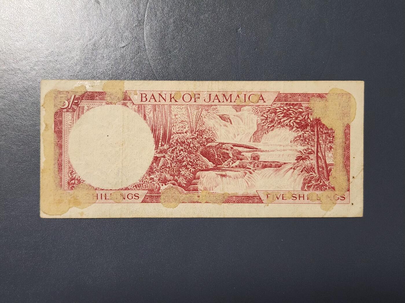 2月24号晚上8点 外国纸币自动截拍第30场 牙买加5先令原票背面粘贴纸
