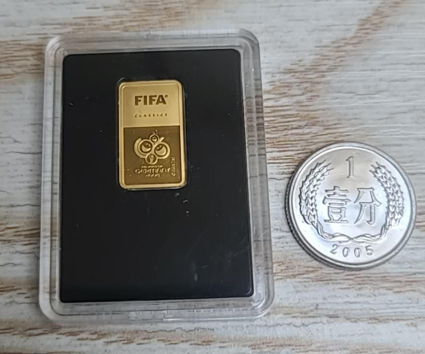 【币将精彩】世界钱币拍卖（2026-3-11） 所罗门FIFA德国世界杯0.5克方形金币9999纯金