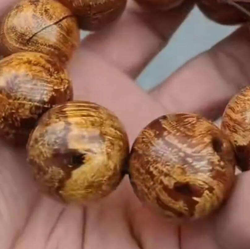 大尺寸麻梨疙瘩金线手串