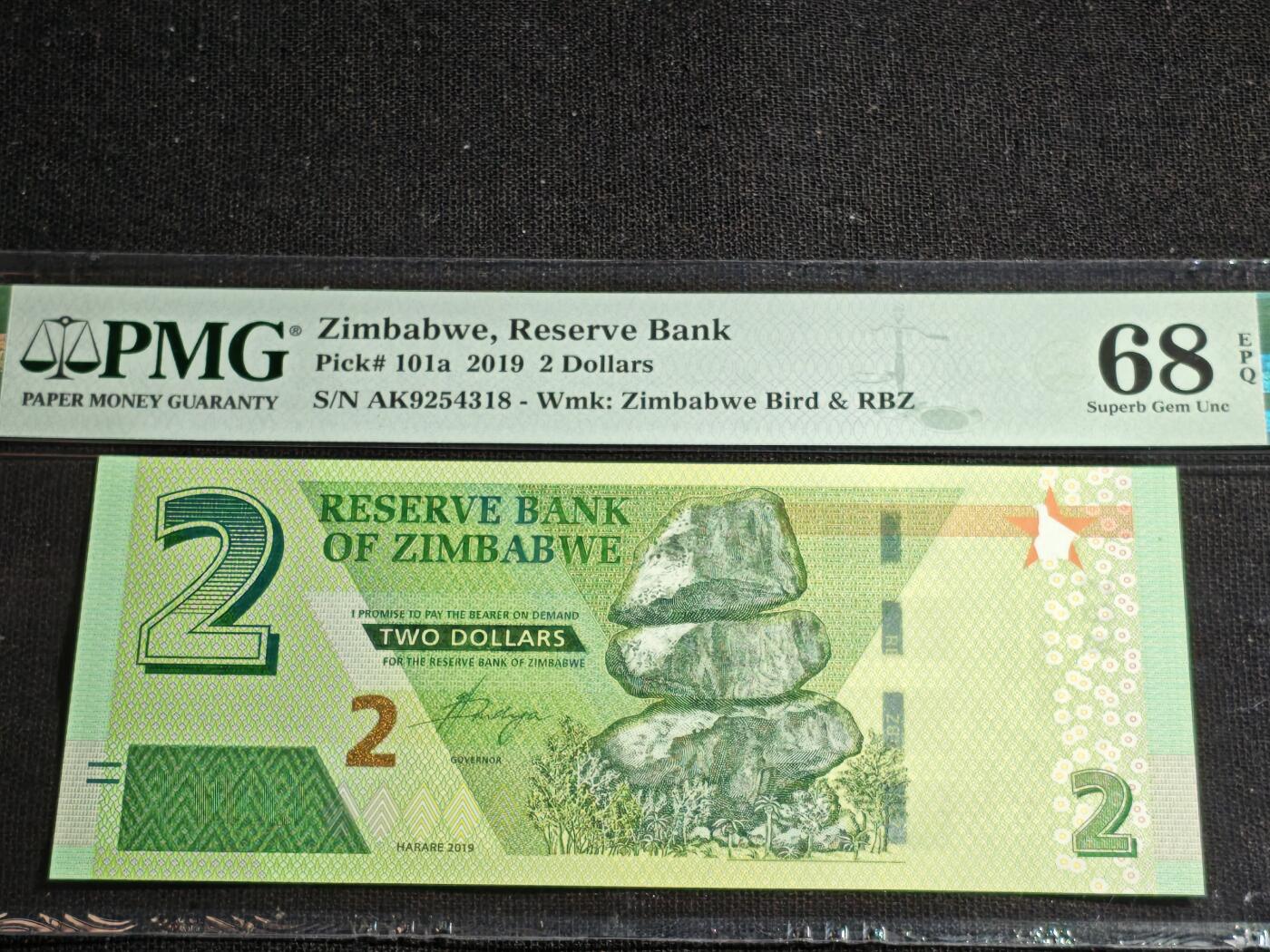 刘世昌艺术品销售中心～虎踞龙蟠*金杨在线联拍群第517期 津巴布韦2019年2元（PMG  68E   号码：AK9254318）1枚。