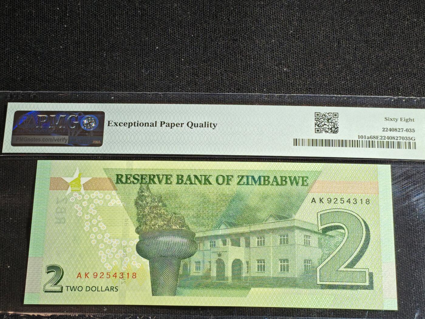 刘世昌艺术品销售中心～虎踞龙蟠*金杨在线联拍群第517期 津巴布韦2019年2元（PMG  68E   号码：AK9254318）1枚。