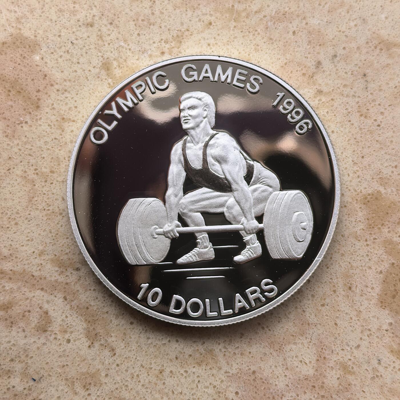 道一币馆币章第一百六十八场 瑙鲁1995年洛杉矶奥运会-举重10元精制银币 31.47g 925S 10000