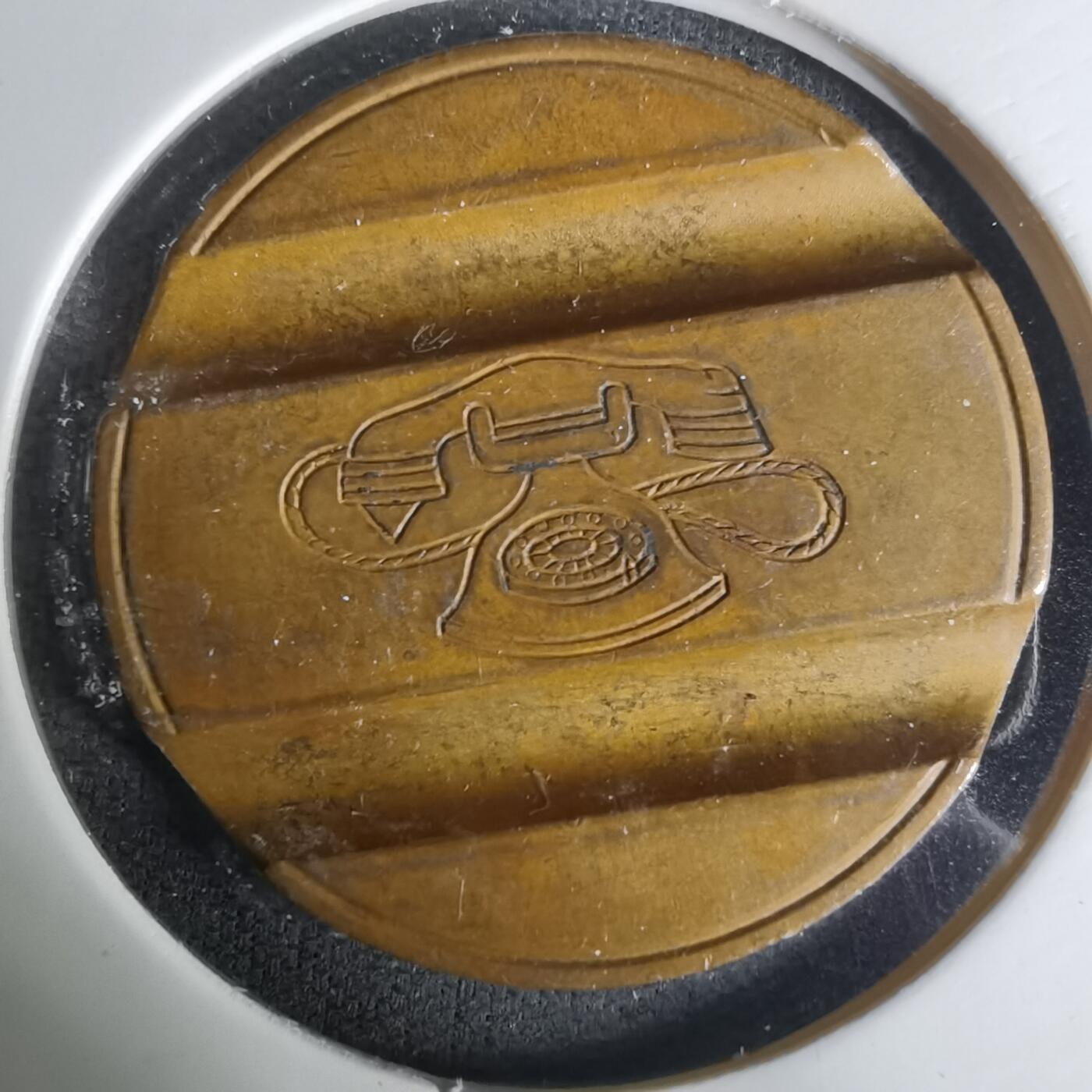 沼泽如烟--第1004场 意大利的电话代币（Gettone Telefonico），是20世纪意大利公共电话系统中使用的金属代币。