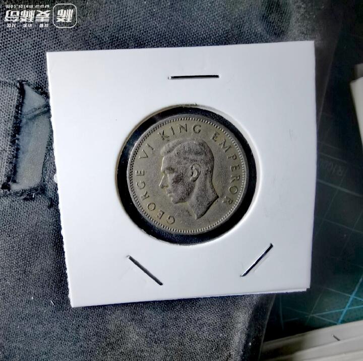 新西兰1947年1先令毛利人持棍图案银质美品硬币