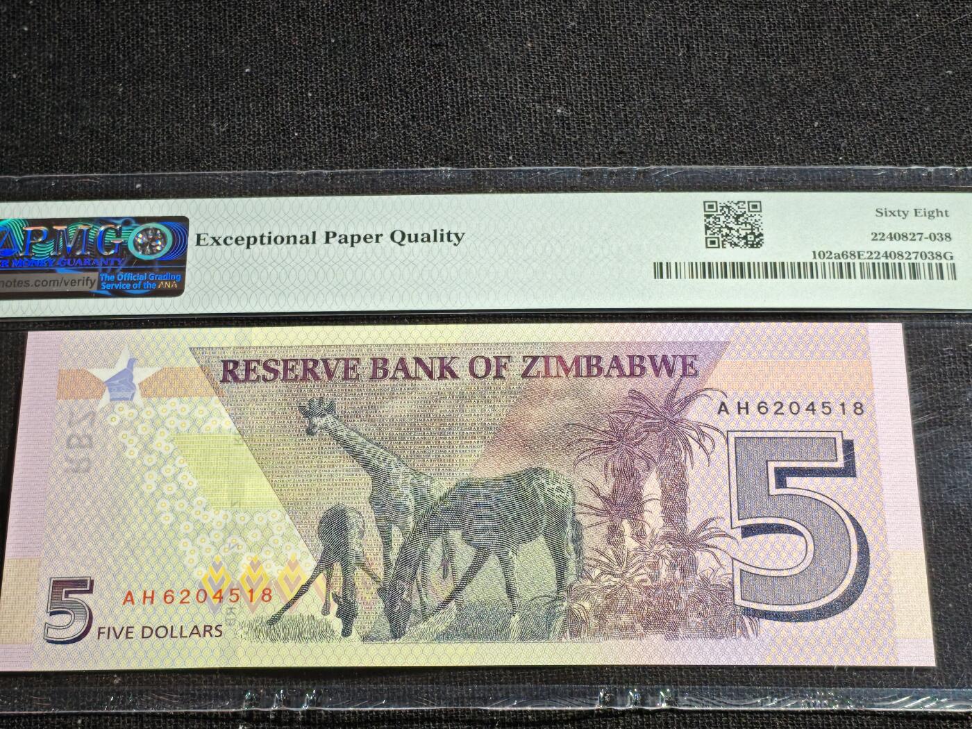 刘世昌艺术品销售中心～虎踞龙蟠*金杨在线联拍群第517期 津巴布韦2019年5元（PMG  68E   号码：AH6204518）1枚。