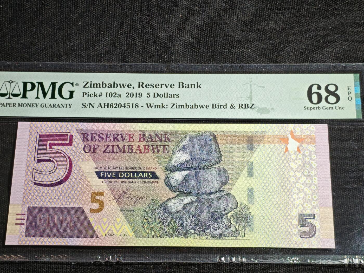 刘世昌艺术品销售中心～虎踞龙蟠*金杨在线联拍群第517期 津巴布韦2019年5元（PMG  68E   号码：AH6204518）1枚。
