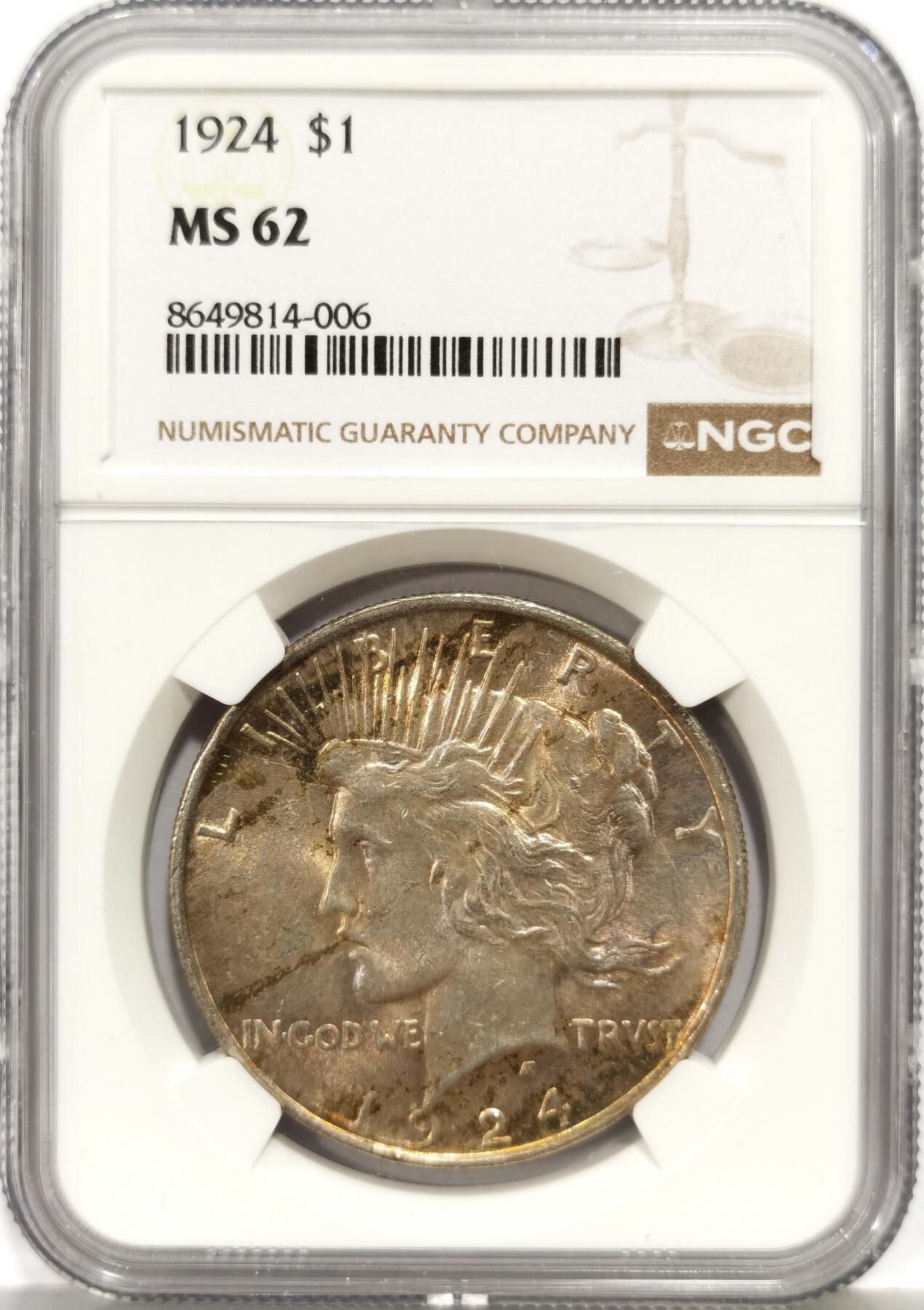 博洋堂世界钱币拍卖第162期（全场包邮） NGC MS62 美国1924年和平银币，双面非常惊艳的五彩硫化包浆，金色中透这幽绿色，比白币难得太多，光度一流，绸缎光明显，标准64分品相严重低评
