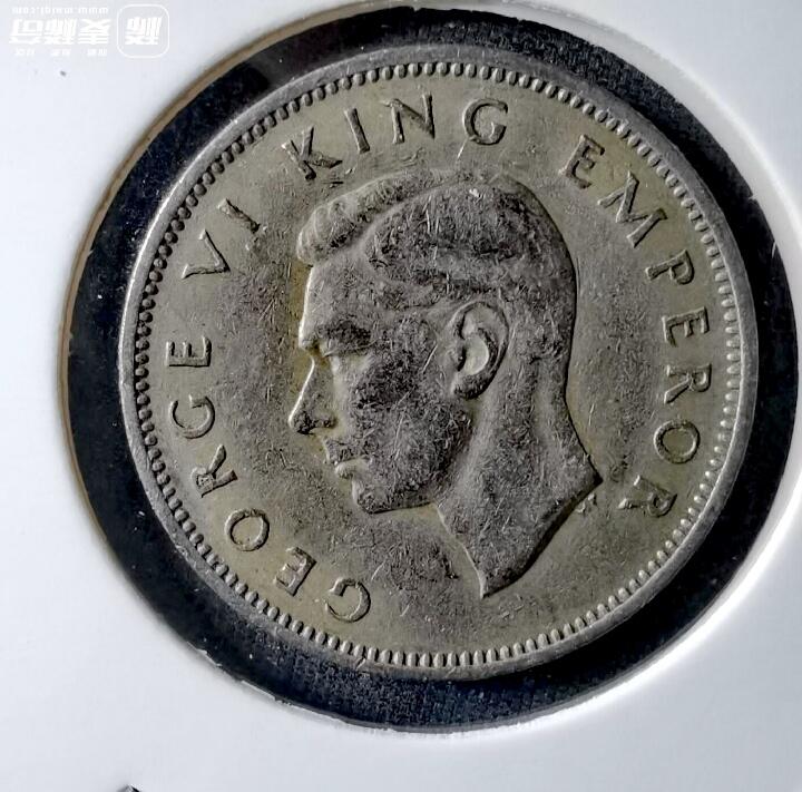 新西兰1947年1先令毛利人持棍图案银质美品硬币