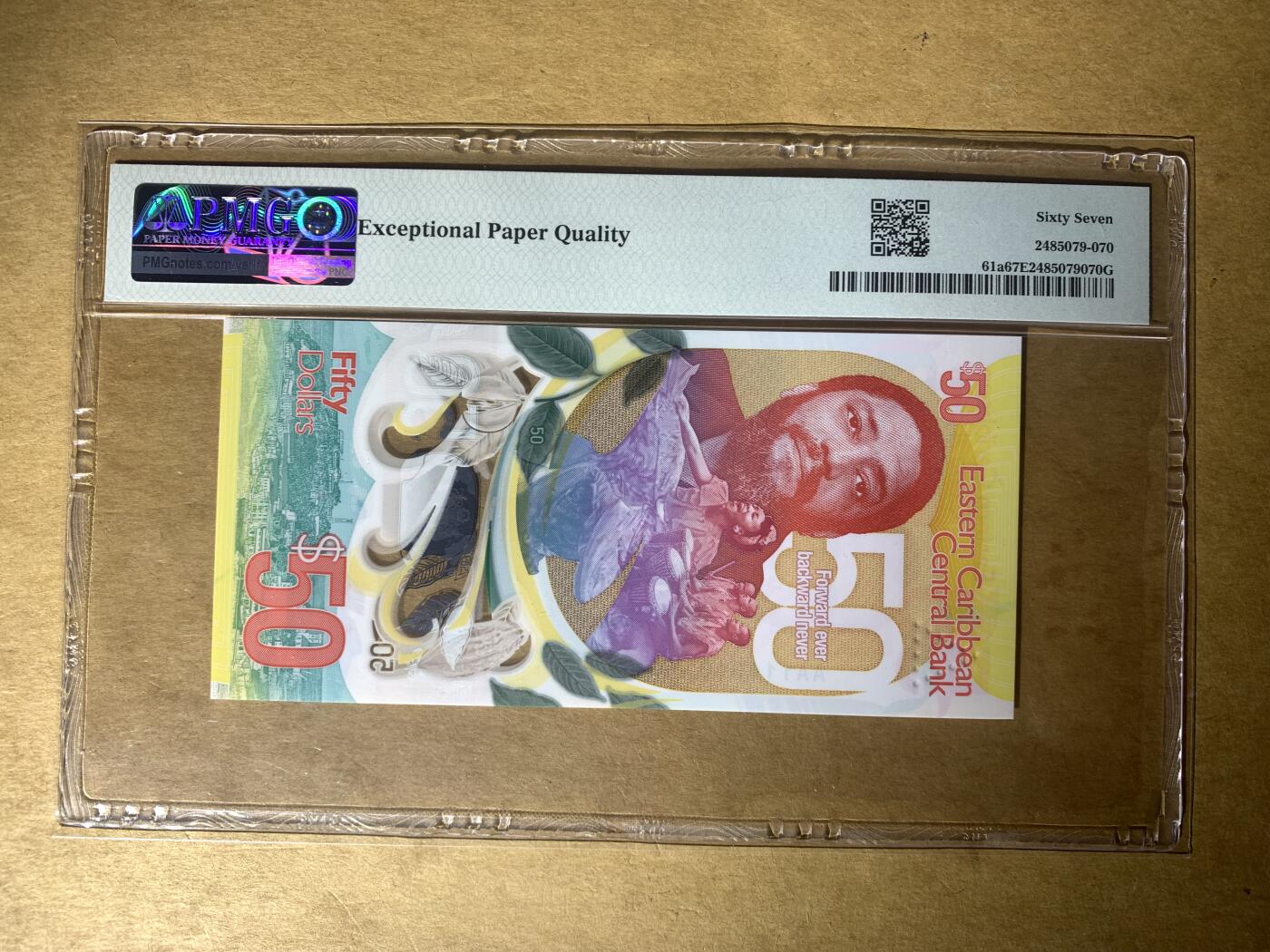 【礼羽收藏】🌏世界钱币拍卖129期 【AA111018】全新UNC 2024年东加勒比50元塑料纪念钞 AA首发冠 无3457尾018 数三 倒置号 PMG67 高分靓号