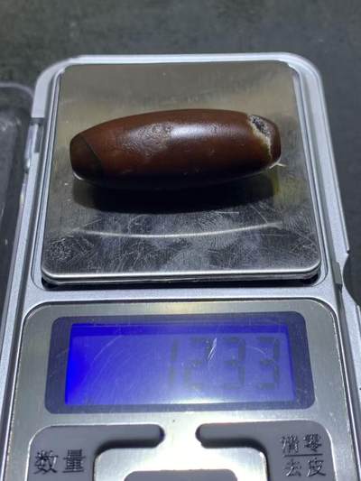 高玉化酒红色玛瑙随形桶珠一颗， 高玉化酒红色玛瑙随形桶珠一颗，