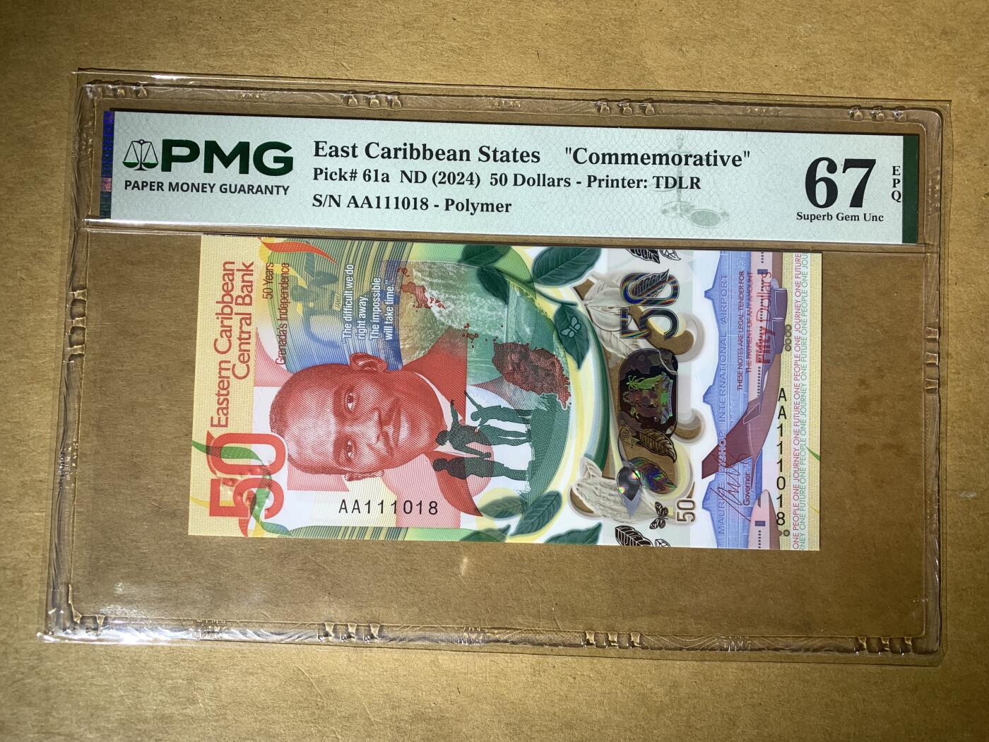 【礼羽收藏】🌏世界钱币拍卖129期 【AA111018】全新UNC 2024年东加勒比50元塑料纪念钞 AA首发冠 无3457尾018 数三 倒置号 PMG67 高分靓号