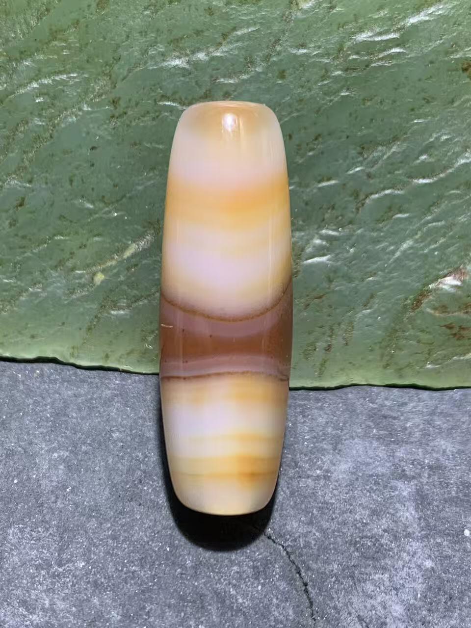 高玉化千层纹巴西玛瑙随形通货桶珠一个，，。