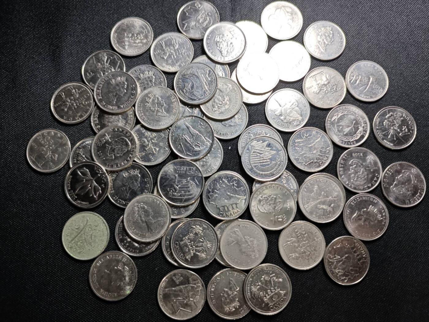 KK钱币收藏小铺   套币 批量/好品散币专场 2月预留时间 周末发货  加拿大25分纪念币一组61枚