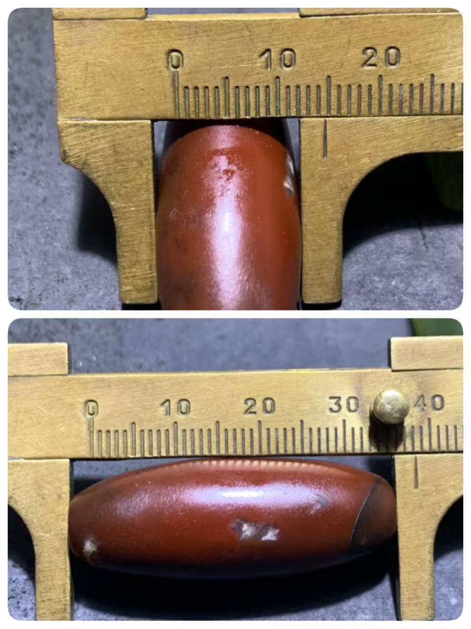 高玉化酒红色玛瑙随形桶珠一颗，