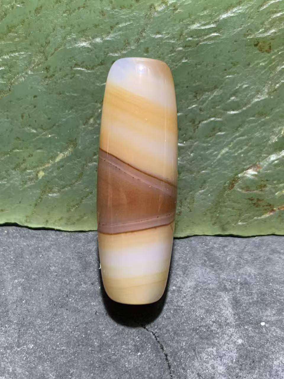 高玉化千层纹巴西玛瑙随形通货桶珠一个，，。