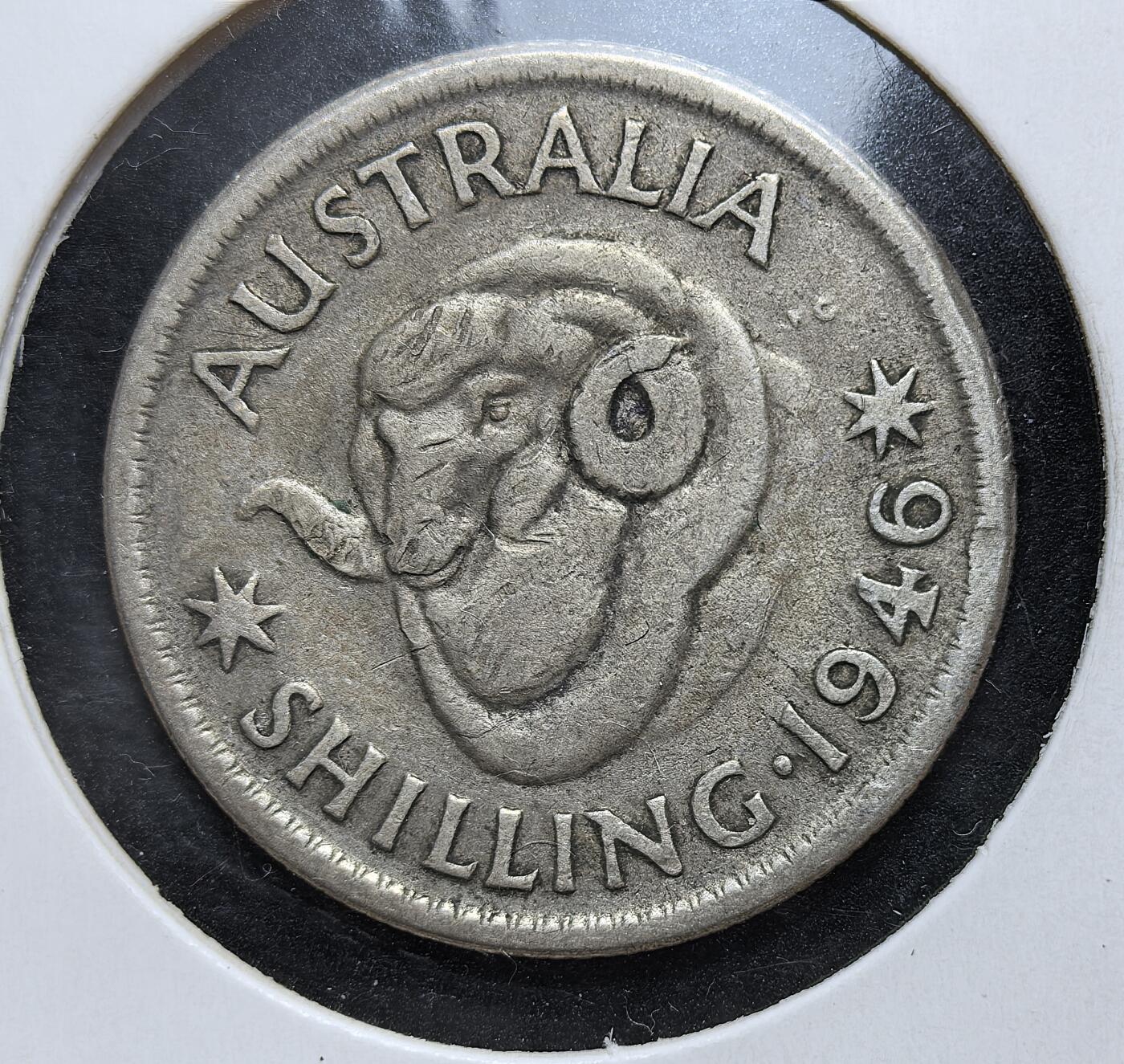 外国优质老铜币银币，正月十二晚九点倒数截拍，满百包邮可寄存，持续收拍 澳大利亚1946 年1先令银币，正面为英王乔治六世像，背面是象征澳洲支柱产业的美利奴公羊。它发行于二战结束初期，是澳大利亚战后经济重建阶段的核心流通银币，也是其畜牧业立国的历史见证。