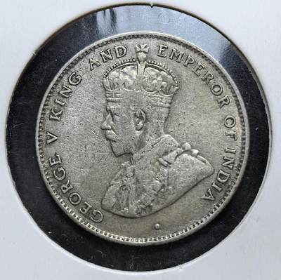 外国优质老铜币银币，正月十二晚九点倒数截拍，满百包邮可寄存，持续收拍 - 英属锡兰1928年50分银币，正面为英王乔治五世像，背面是锡兰国树铁木树与双语面值。发行于一战后经济恢复期，是英国殖民统治的货币遗存，见证了锡兰的殖民贸易与多元文化融合。