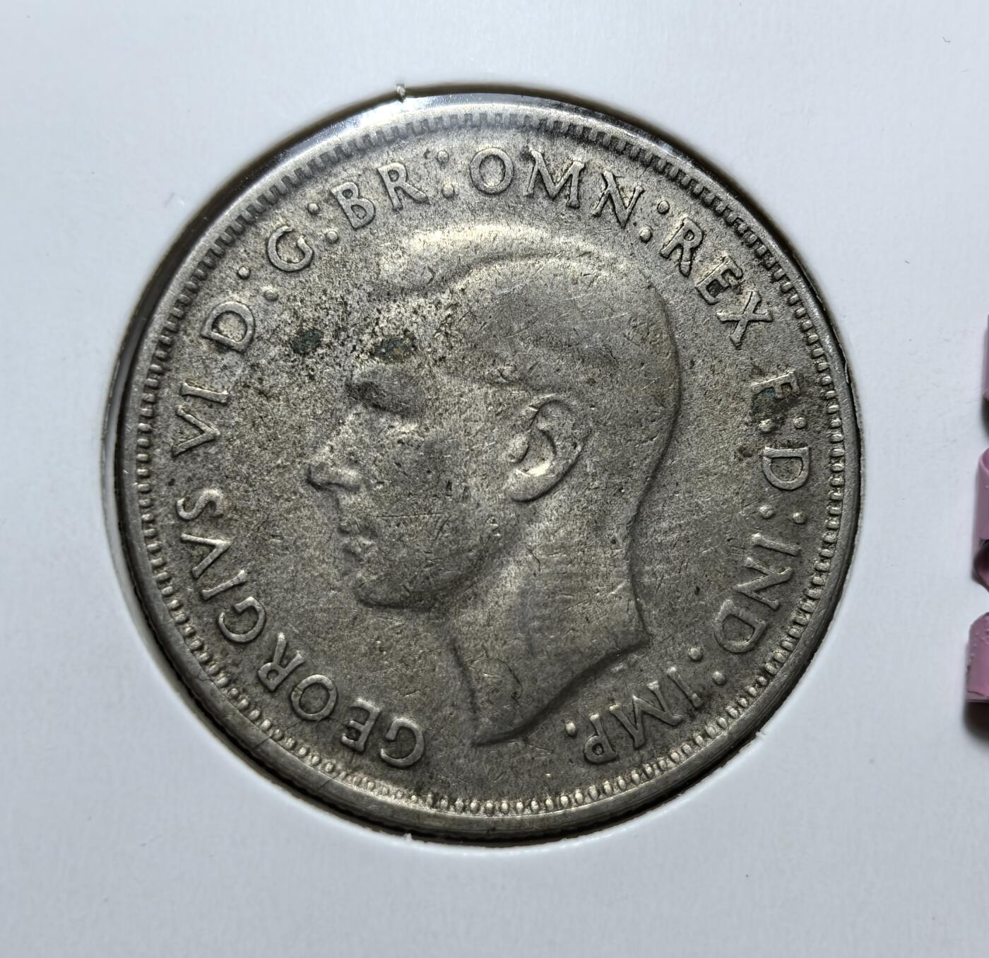 外国优质老铜币银币，正月十二晚九点倒数截拍，满百包邮可寄存，持续收拍 澳大利亚 1947年1弗洛林银币，正面为英王乔治六世像，背面是袋鼠与鸸鹋环绕的国徽。它发行于二战后货币过渡时期，是英联邦时代澳大利亚的代表性流通银币。