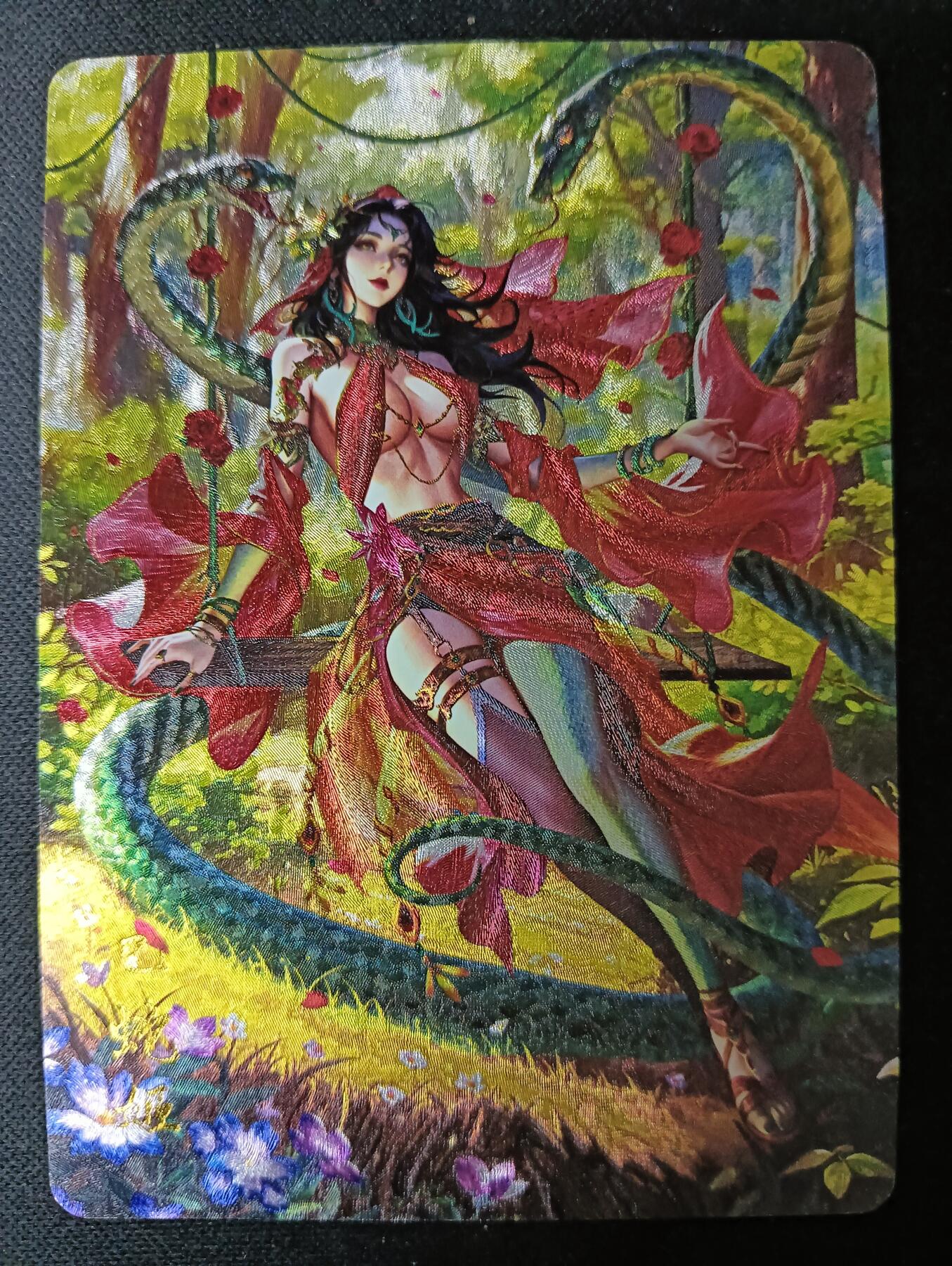 花开卡拍第61期（3月7号周六截拍，品控勿拍!!!拍品不寄存，运费5元（新疆需补运费差价或顺丰到付），自制卡难免瑕疵，可能存在轻微撞角爆边等出厂瑕疵，品控介意勿拍！） 百里 巳蛇姬 1张 粗闪