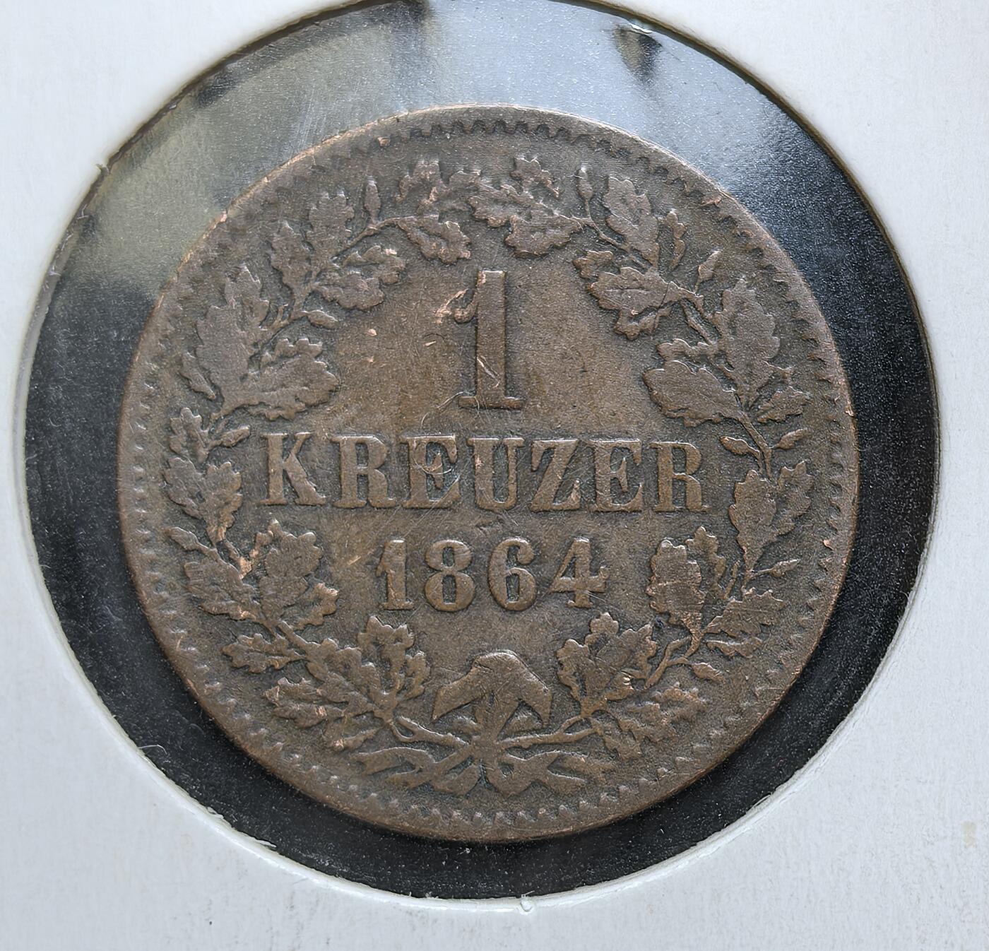 外国优质老铜币银币，正月十二晚九点倒数截拍，满百包邮可寄存，持续收拍 巴登大公国1864年1克鲁泽铜币，正面为面值与橡叶纹饰，背面是巴登的双头鹰盾徽。此币属于德意志邦联时期的地方货币，见证了巴登在 19 世纪中叶，作为独立邦国的货币体系运行。